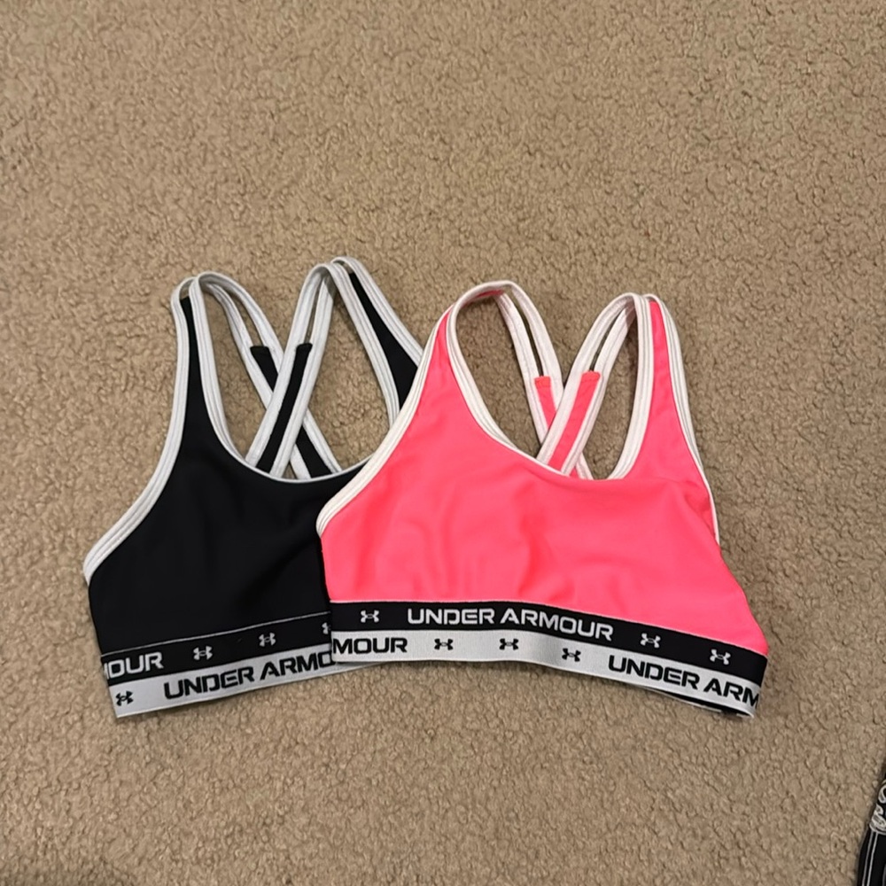 2 girls Under Armour sports bras